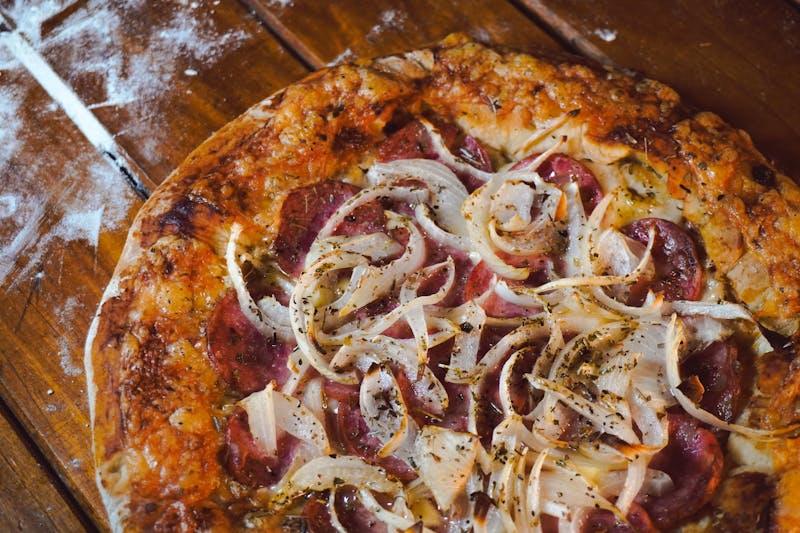 BBQ Chicken marco pizza with caramelised onions